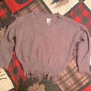 From a boutique. Purple, frayed sweater, size small